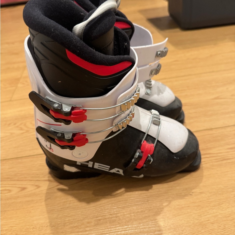 Boys Head Black and White Ski Boots with Red Highlights